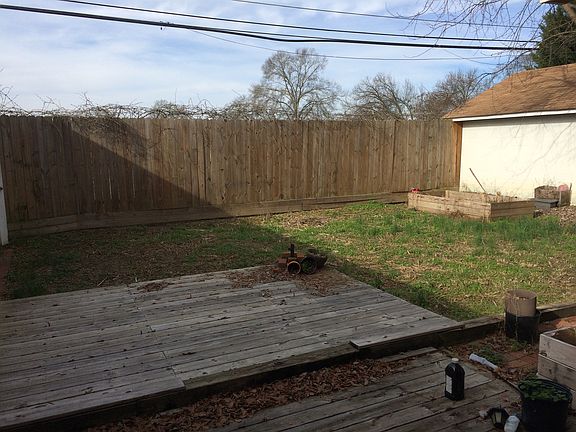 Open backyard with fence