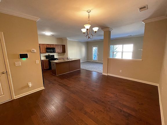 Dining room, open to kitchen and family rooms.
