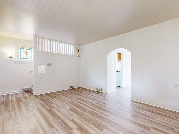Stained glass accent on stairs to second floor.
