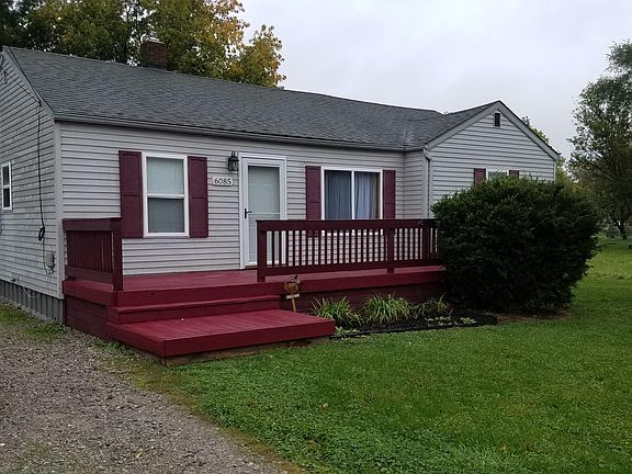 Third view of front of house (wet)