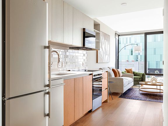 Modern/gourmet kitchen with stainless steel Whirlpool appliances