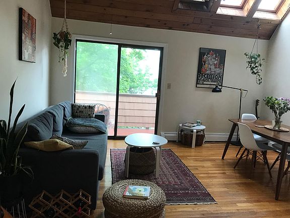 Main floor, looking from spiral stair to sliding doors