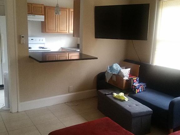 Living room adjoiNing kitchen