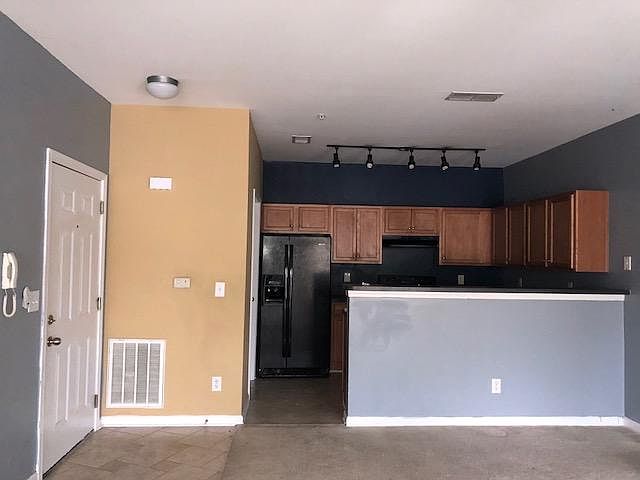 View from living area to Kitchen/Laundry