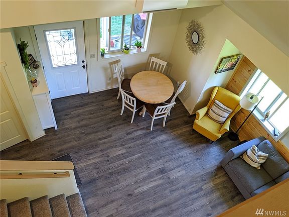 Another angle, with no lights on -- that front deck needs your rocking chairs and twin Boerboel puppies!