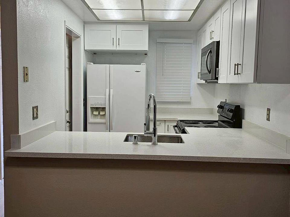 Newly renovated kitchen, new cabinets and countertops, new microwave