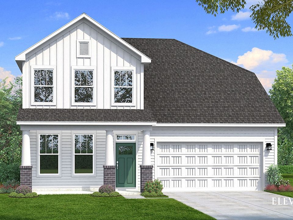 Two-story single family home with white siding, a covered front porch and 2 car garage.