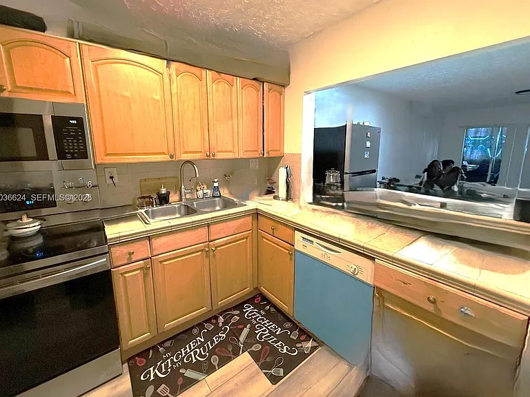 6070 W 18th Ave #209 — Photo 3