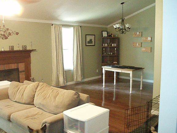 Living room opens to dining