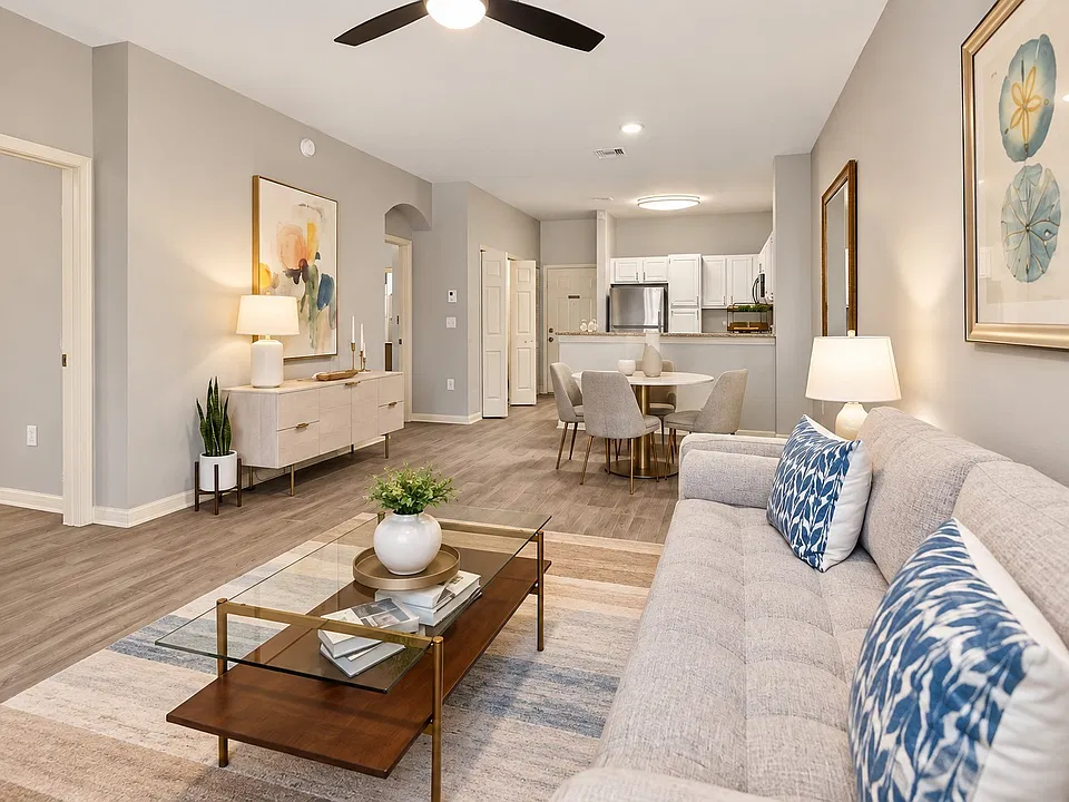 Step into the elegance of Villas of Juno, where modern design meets comfort. This inviting living space blends style with functionality, perfect for relaxation or entertaining. Don't miss your chanceschedule a tour today!