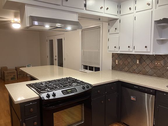 Range and Vent Hood towards the dining area