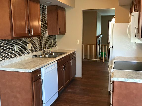 New kitchen cabinets, tiled backsplash, stainless steel appliances (not pictured)