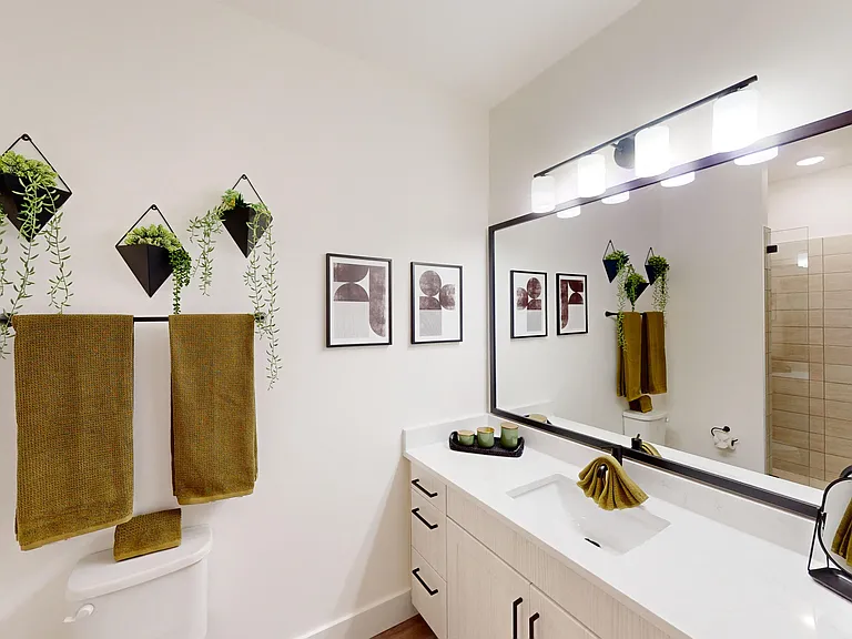 Bathroom with framed mirror