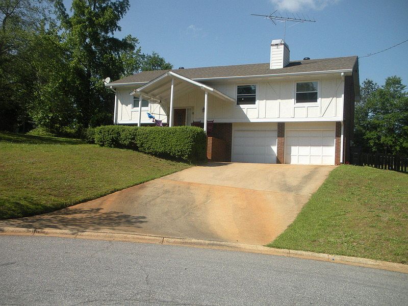 Front of home : Rocking chair front porch, new windows, fairly new roof, on a large lot
