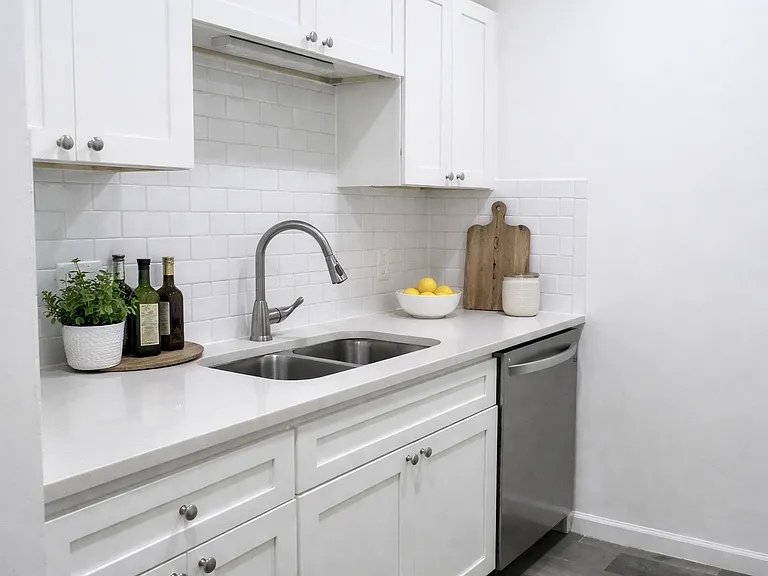 Beautifully Updated Kitchen with Quartz Countertops and Stainless Appliances *Virtually Staged*
