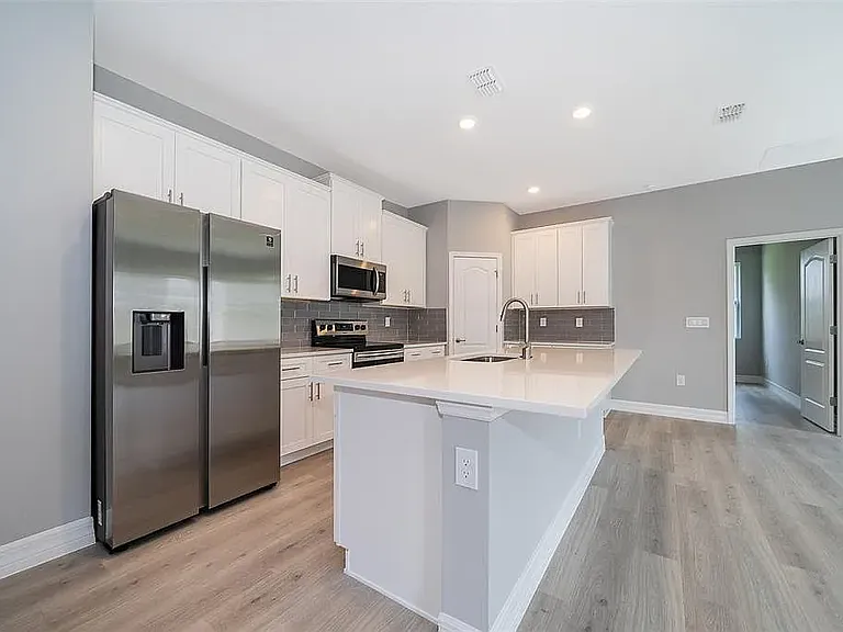 5574 SW 128th Pl — Photo 23