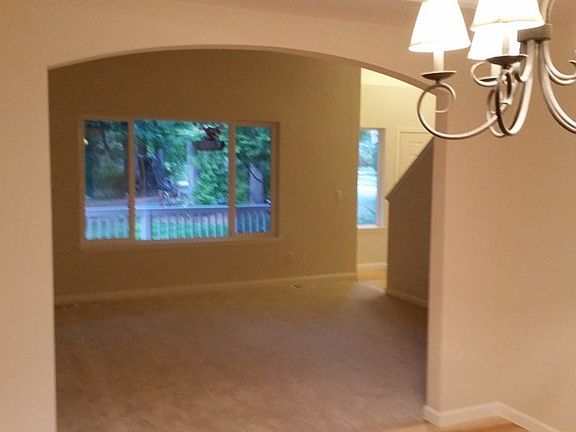 Spacious Formal Dining Room
						:
						New Hardwood Floors w/ Rustic Chandelier.