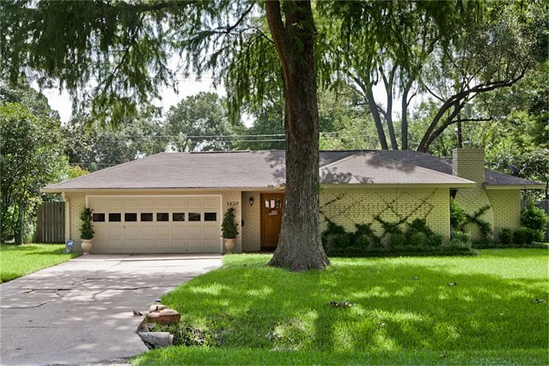 Recently painted exterior 3/14 solid wood paneled front door. This home has it all with six zone spr