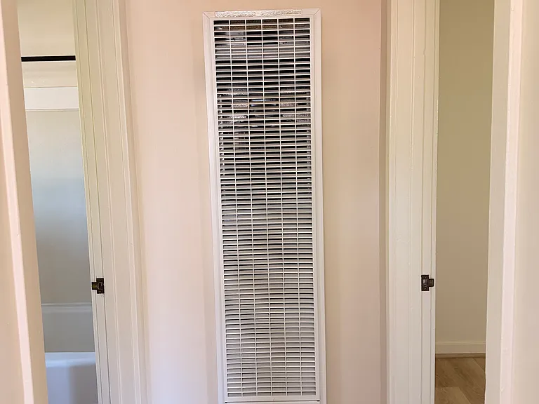 Hallway (bathroom on the left, bedroom on the right)