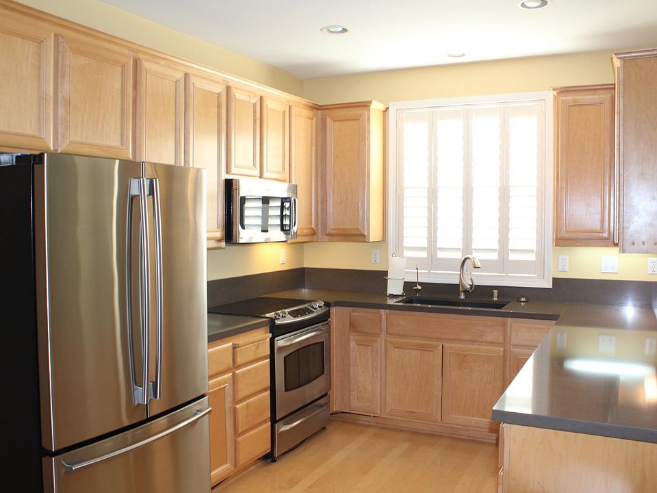 Huge kitchen with Cesaer stone counters.