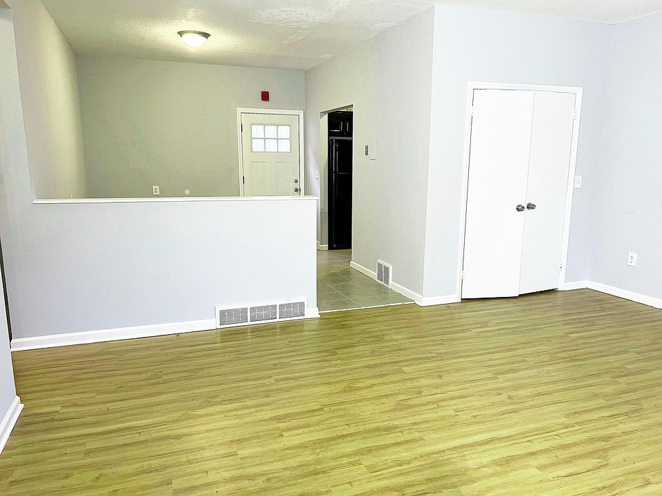 View from Livingroom into Dining and Kitchen off to the right