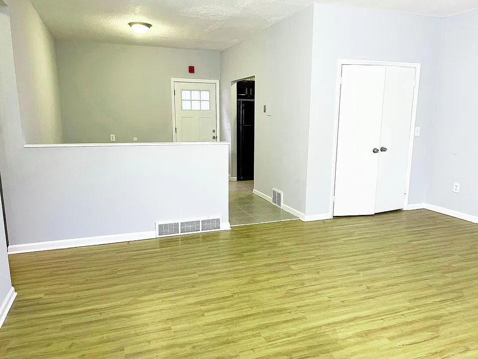 View from Livingroom into Dining and Kitchen off to the right