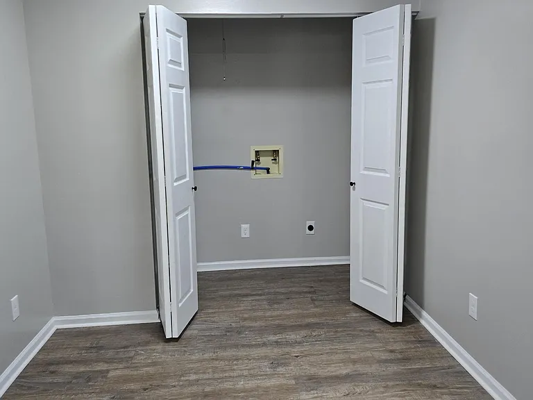 Laundry hook up. Closet large enough for regular sized washer and dryer.