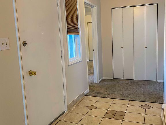 Entrance, door to master bedroom and hall closet.