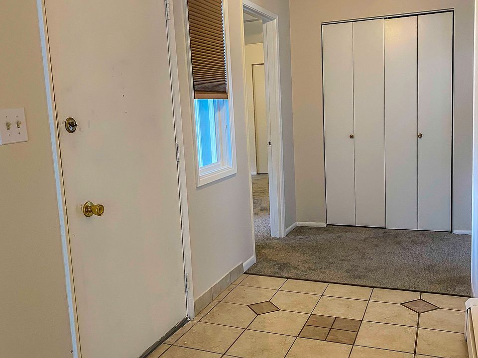 Entrance, door to master bedroom and hall closet.