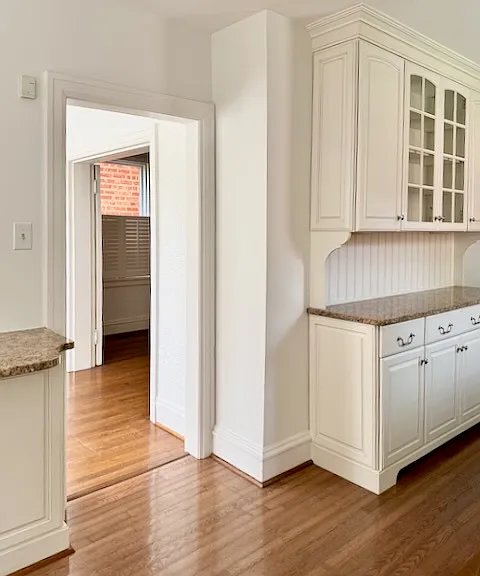 Kitchen, looking through breakfast room into dining room