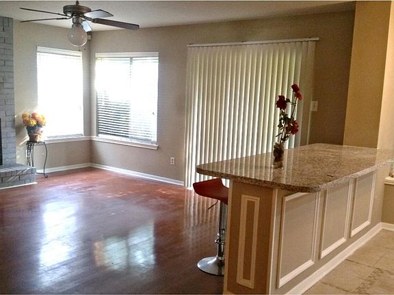 Cozy gaslog fireplace in family room