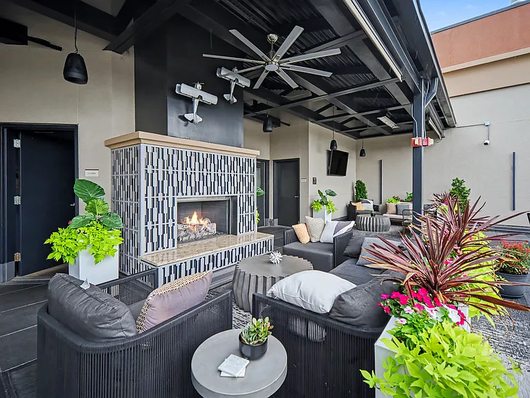 The community terrace has THE best views of the Uptown skyline, two fire places, a new grill and bar, and TVs. Perfect for hosting, can be rented through the HOA for private events
