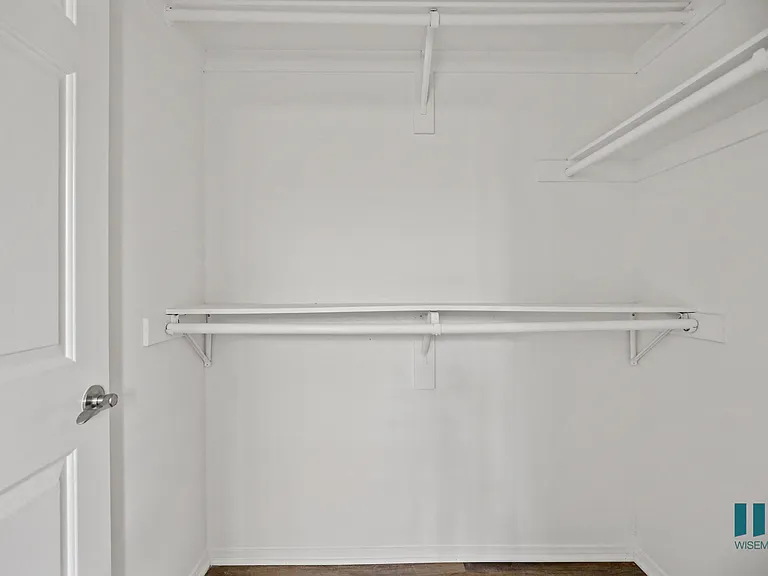 Walk-In Closet with Double Hanging Rods