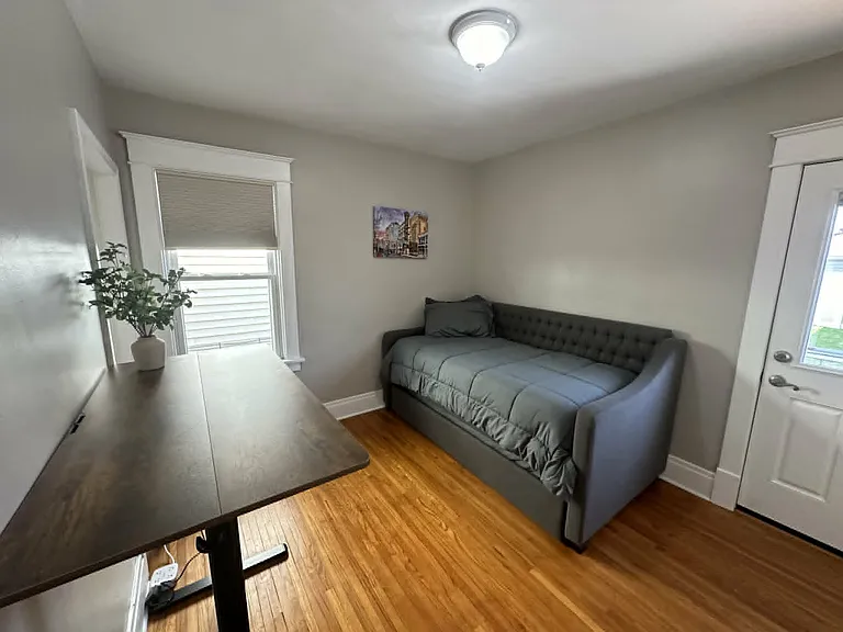 Versatile third bedroom that can be used as a guest room, office, or flex space.
