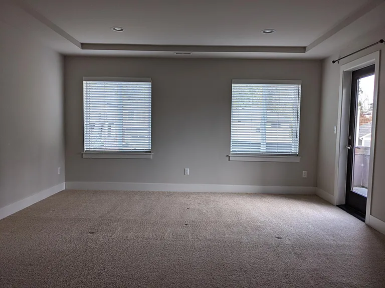 Master Bedroom with door to Balcony.