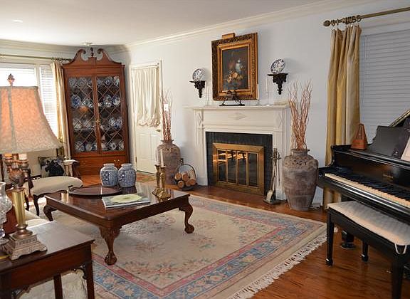 Living Room w/ wood burning fireplace