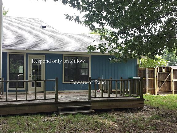 Back of house showing deck