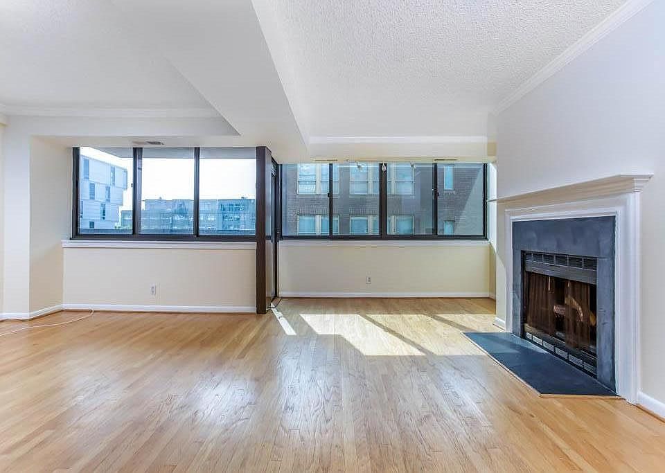 Dinging Area with Fireplace in front of windows