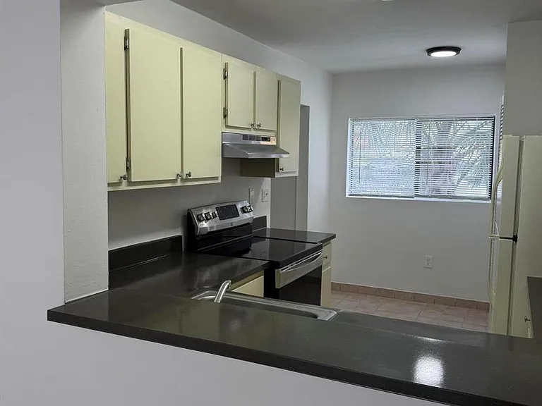 417 Palm Cir E #417 — Photo 16