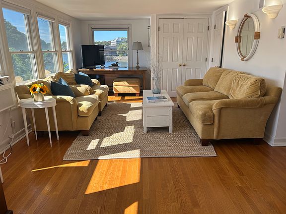 Family room overlooks the Saugatuck River.