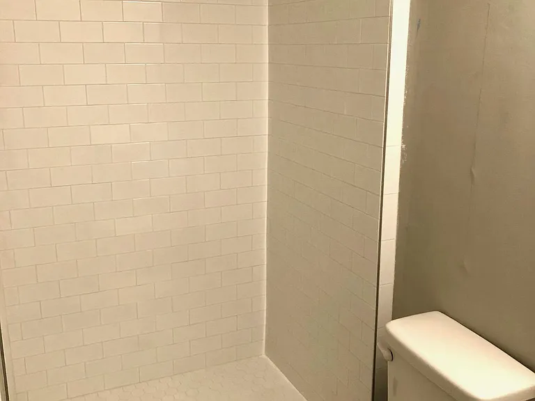 Bathroom 1 (with brand new custom subway tile).