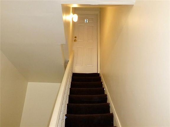 Entry and stairs leading to 2nd Floor unit