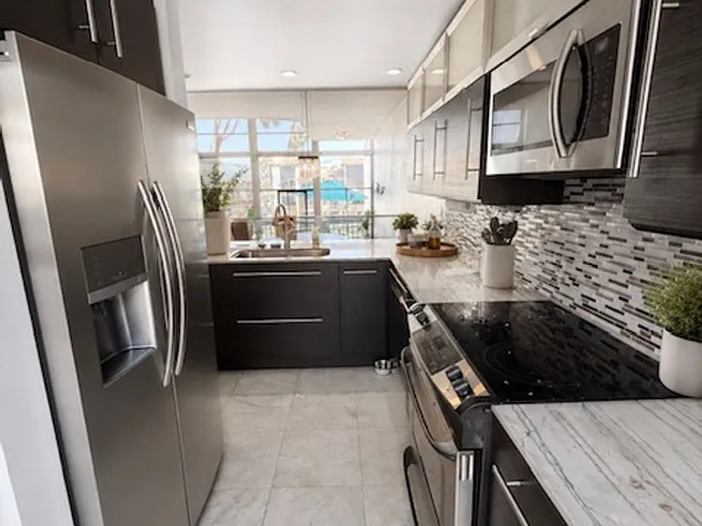 7334 Marina Pacifica Dr N — Photo 1