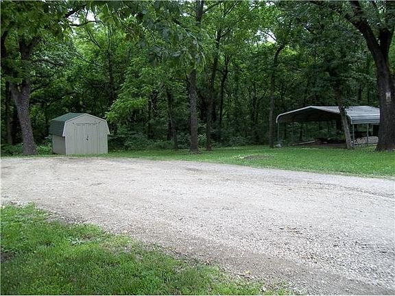 VIEW ACROSS DRIVEWAY AND PART OF THIRD LOT