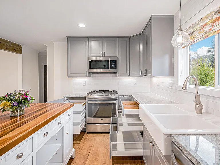 Multiple custom storage systems in kitchen cabinets and drawers