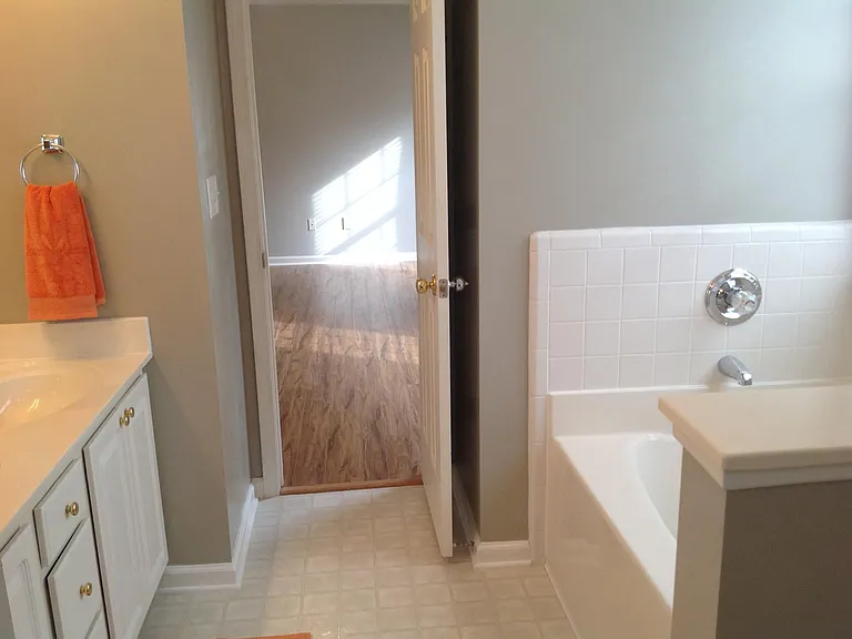 Floor has large slate gray tiles_no more linoleum.