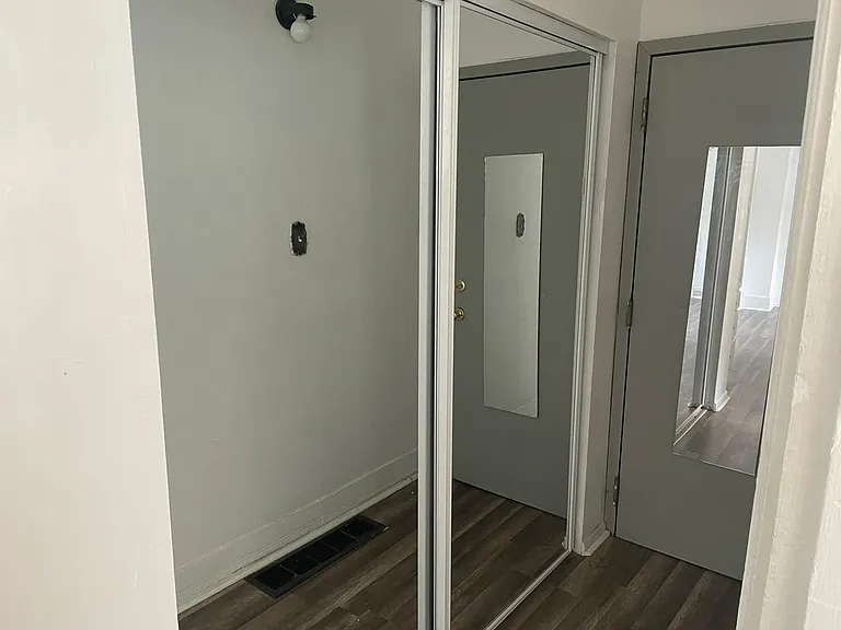 Vestibule sliding mirror doors closet