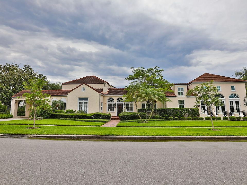 The apartment for rent is on the grounds of this original 1926 Davis Islands home