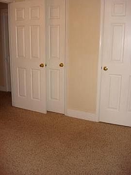 bedroom with 2 closets
