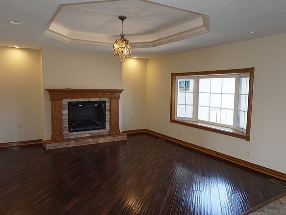 Living Room with Tray Ceiling